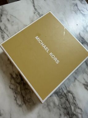 Michael Kors pale ocean colored coaster set